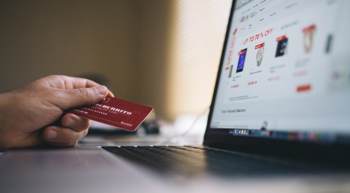 Why Are Prepaid Cards Ideal for A Business? person using prepaid card