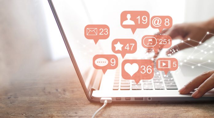 Woman hands using social network