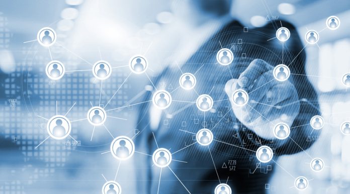 Businessman drawing global structure