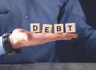 Can You Start A Business When Your Personally in Debt? start a business