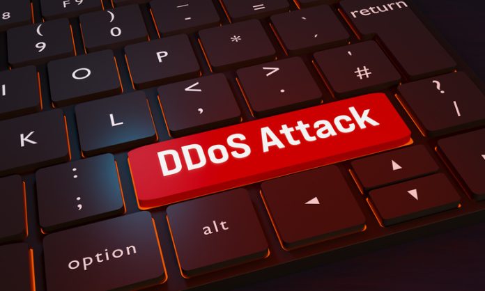 DDoS attack key on the keyboard.