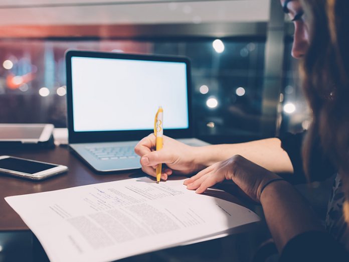graphicstock-close-up-on-tha-hand-of-young-woman-writing-down-on-a-paper-using-smart-phone-and-notebook_HacbXrcJb-scaled Writing an Outline