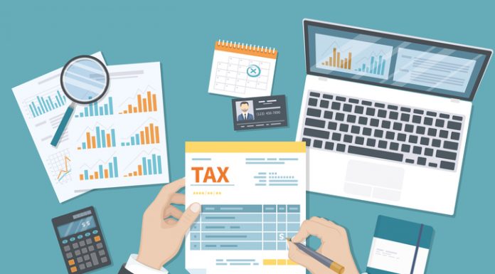 Tax payment concept. State Government taxation, calculation of tax return. Man fills the tax form, documents, calendar, calculator, laptop. Pay the bills, invoices, payrolls. Vector illustration.