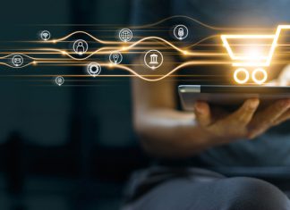 Online shopping and payment, Man using tablet with shopping cart icon, Digital marketing, Banking and finance on dark blue background.