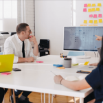 Employees Discussing a Project