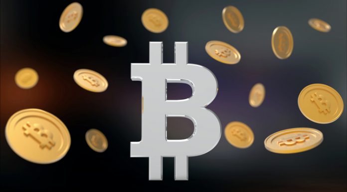 Bitcoin symbol surrounded by bitcoins falling from above -3D Illustration