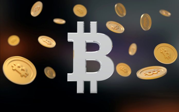 Bitcoin symbol surrounded by bitcoins falling from above -3D Illustration
