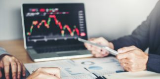 A Guide to How You Can Make a Profit Trading in Currencies Business Team Investment Entrepreneur Trading discussing and analysis graph stock market trading,stock chart concept