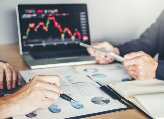 Business Team Investment Entrepreneur Trading discussing and analysis graph stock market trading,stock chart concept