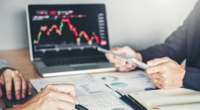 Business Team Investment Entrepreneur Trading discussing and analysis graph stock market trading,stock chart concept