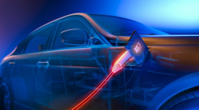 Electric Car Charging At Power Station - New alternative power energy concept