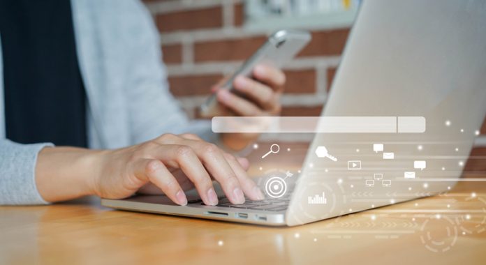 close up man hand type on keyboard laptop to use search engine optimization (SEO) tools for finding customer or promote and advertise about content online for marketing technology and business concept close up man hand type on keyboard laptop to use search engine optimization (SEO) tools for finding customer or promote and advertise about content online for marketing technology and business concept