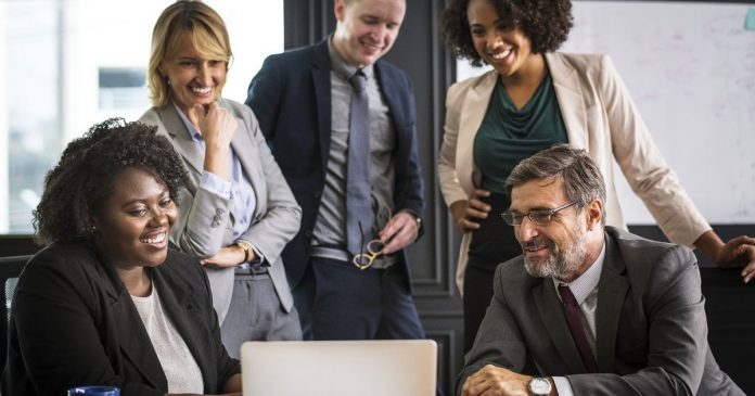 Development team working together Employees discussing app development framework