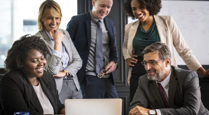 Employees discussing app development framework