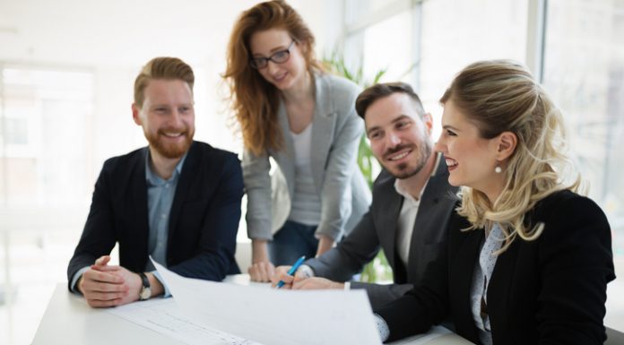 Business coworkers discussing new ideas and brainstorming in a modern office
