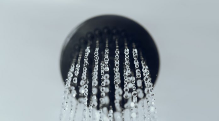 shower head with water drop flowing.