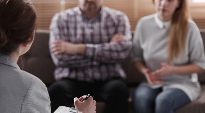 Close-up of therapist for couple analyzing behavior of spouses