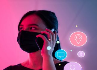 Networking during social distancing woman wearing mask talking o