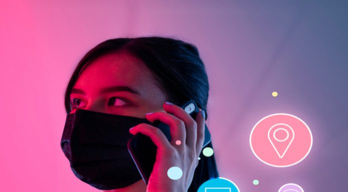 Networking during social distancing woman wearing mask talking o