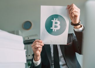 Learn Crypto with a Cryptocurrency Learning Platform businessman-holding-document-paper-with-bitcoin