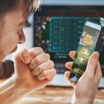Duelbits: Test Your Gambling Skills with this Unique Modern Dice! Man celebrating victory after making bets at bookmaker website