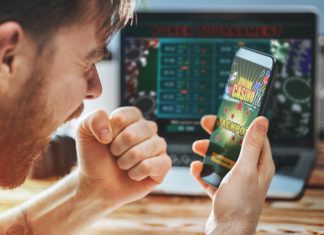 Duelbits: Test Your Gambling Skills with this Unique Modern Dice! Man celebrating victory after making bets at bookmaker website