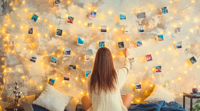 8 Creative Ways to Preserve Happy Memories Young woman weekend at home decorated bedroom nostalgia