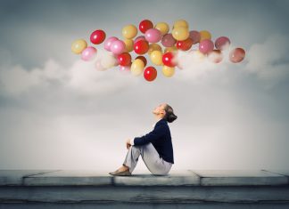 From CV To Interview: The Ultimate Guide To Landing Your Dream Job Businesswoman on roof