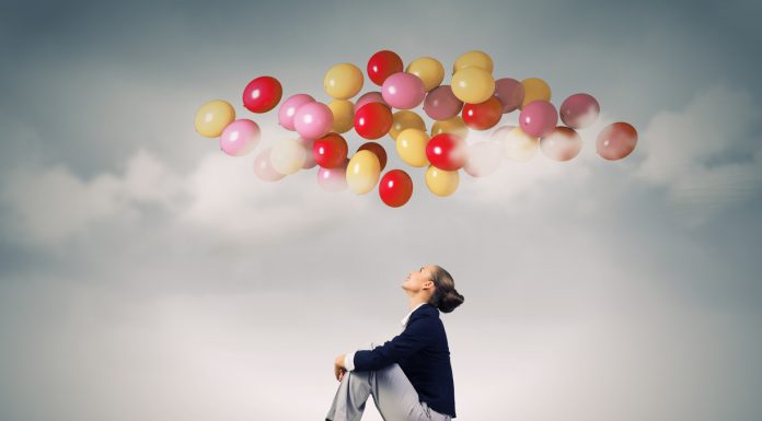 Businesswoman on roof
