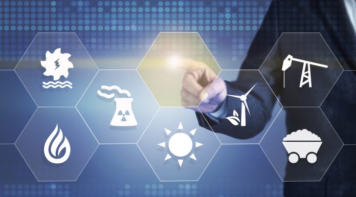 Businessman touching the screen about energy source