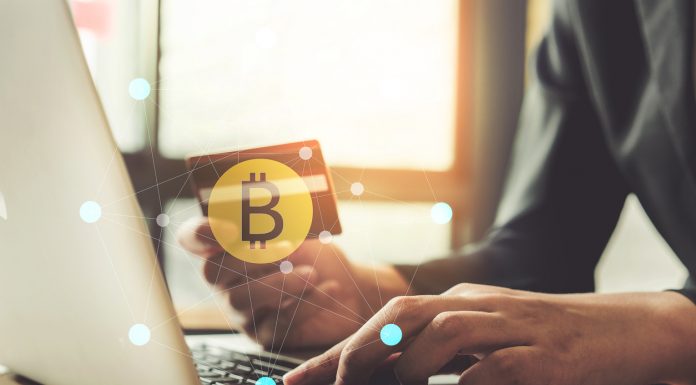 internet banking network and cryptocurrency concept. Man hand using credit card for trade cryptocurrency.