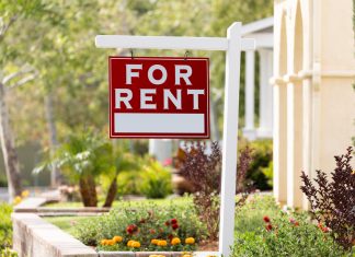 How to Maintain Your Rental Property Red For Rent Real Estate Sign in Front House
