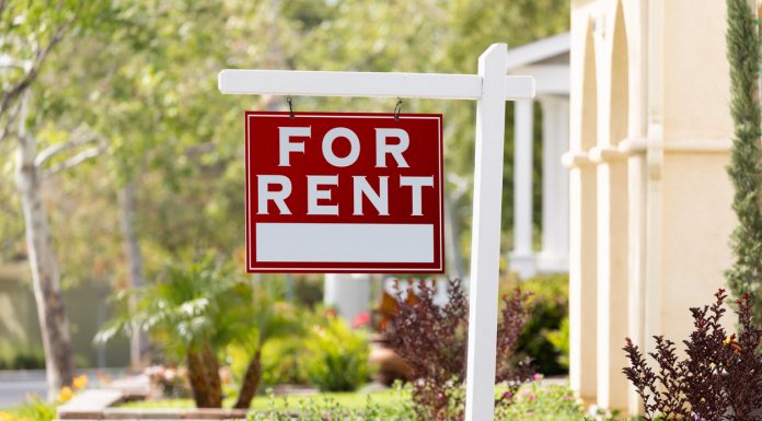 How to Maintain Your Rental Property Red For Rent Real Estate Sign in Front House