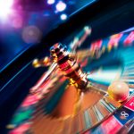 IGaming Trends We Expect To See In 2022 Roulette wheel in motion with a bright and colorful background