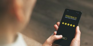 Top 10 LLC Formation Services According to Reviews customer feedback - woman using phone to give 5 star rating for good service