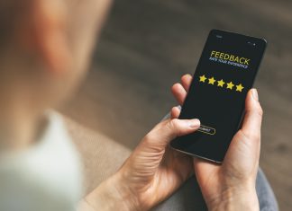 Top 10 LLC Formation Services According to Reviews customer feedback - woman using phone to give 5 star rating for good service