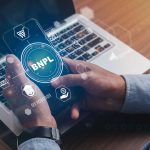 What Is BNPL And Is It Safe? Businessmen holding a smartphone with icons of BNPL with online shopping icons technology. BNPL Buy now pay later online shopping concept.