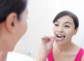 The Growing Popularity of The Clear Aligner Industry In America woman with invisible braces