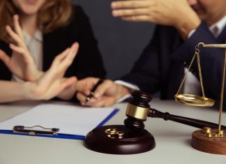 Judge gavel deciding on marriage divorce