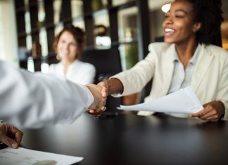 The Art of Discovery Questions in Hiring: How to Ensure you are Asking Candidates the Right Questions Employee people at modern office.