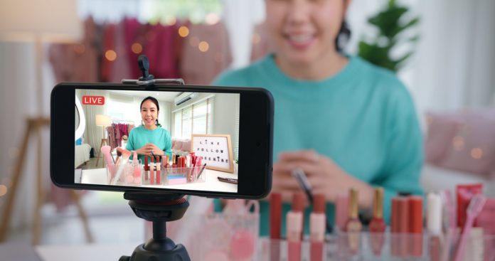 Asia woman micro influencer record live viral video camera at home studio. Happy fun talk speak advice review hobby in media. Vlogger selfie shoot enjoy work show smile teach like share app.