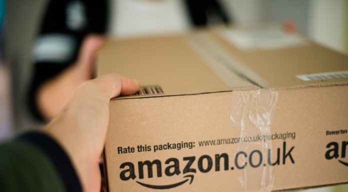 Tips for Selling on Amazon Woman receiving parcel