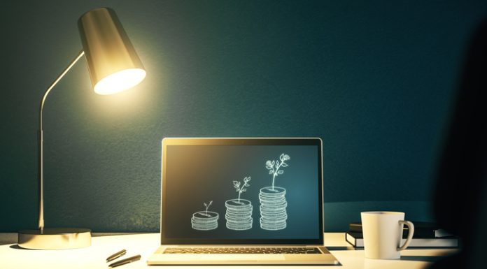 What Should Invest To Get Rich Creative abstract money savings sketch on modern laptop monitor, accumulation and growth of money concept. 3D Rendering