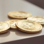 What is the Best Way to Buy and Sell Cryptocurrency? bitcoins on the table