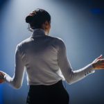 Successful Female Motivational Speaker on Stage, Talking about Happiness, Diversity, Empowerment, Success, Leadership, STEM and How to Be Productive. Woman Presenter Leads Tech Business Conference