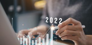 Businessman plan business growth and financial, increase of positive indicators in the year 2022 to increase business growth and an increase for growing up business "n