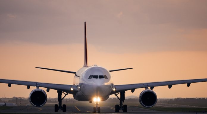 How to Find Airline Promo Codes (plus other ways to save flight costs) Airplane taxiing for take off"n