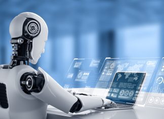 Bitcode AI Review: Deep Insights About The Reliability Of This Trading Bot Robot humanoid use laptop and sit at table for big data analytic