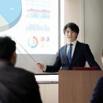 Asian businessman giving a presentation at a conference