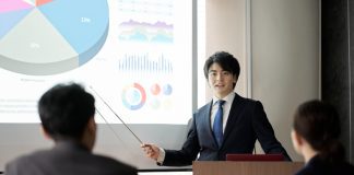 Asian businessman giving a presentation at a conference